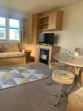 A14 is a 3 bedroom caravan on Whitehouse Leisure park with large decking